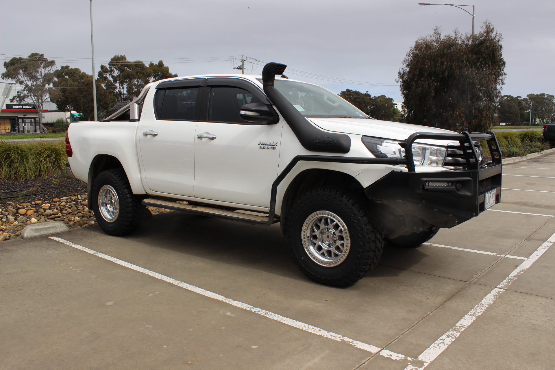 HILUX WITH SILVER MACHINED KMC GRS WHEELS |  | TOYOTA