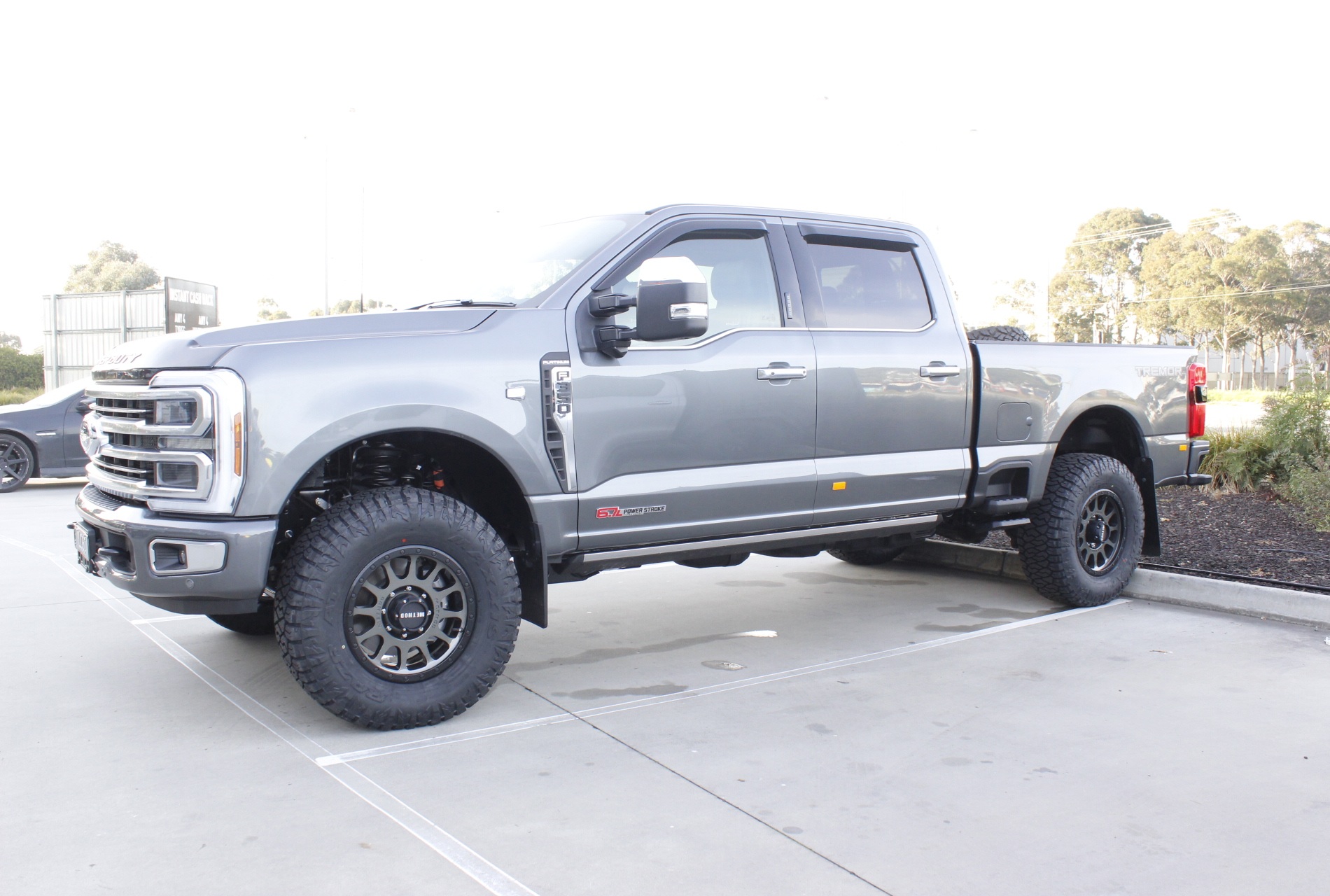 FORD F250 WITH TITANIUM FINISH METHOD 305 NV WHEELS |  | FORD
